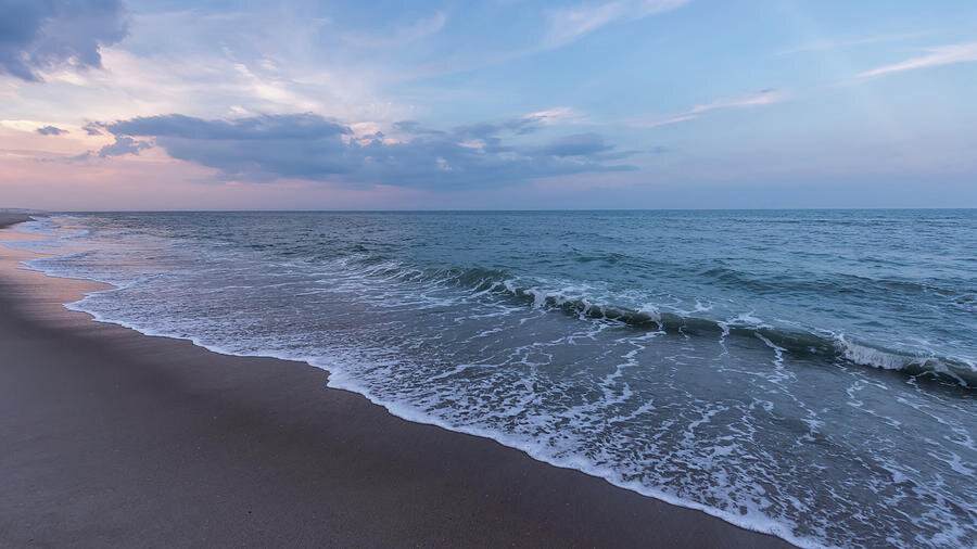 Surf at the Lavallette shoreline at dusk